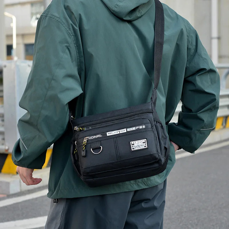 Borsa a Tracolla Uomo in Oxford – Messenger Bag Casual con Tasche Multiple